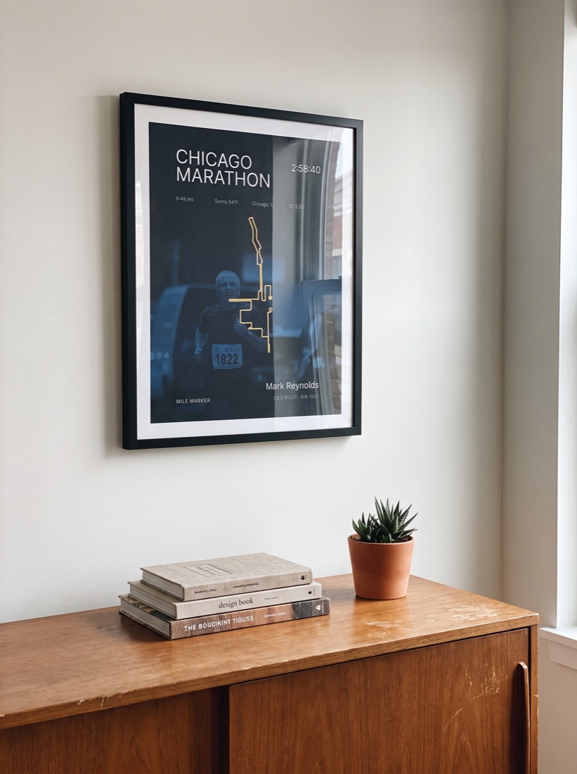 Framed finisher print on a living-room wall